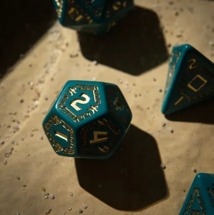 Q-Workshop - RuneQuest RPG Dice Set: Turquoise & Gold (7-delig)